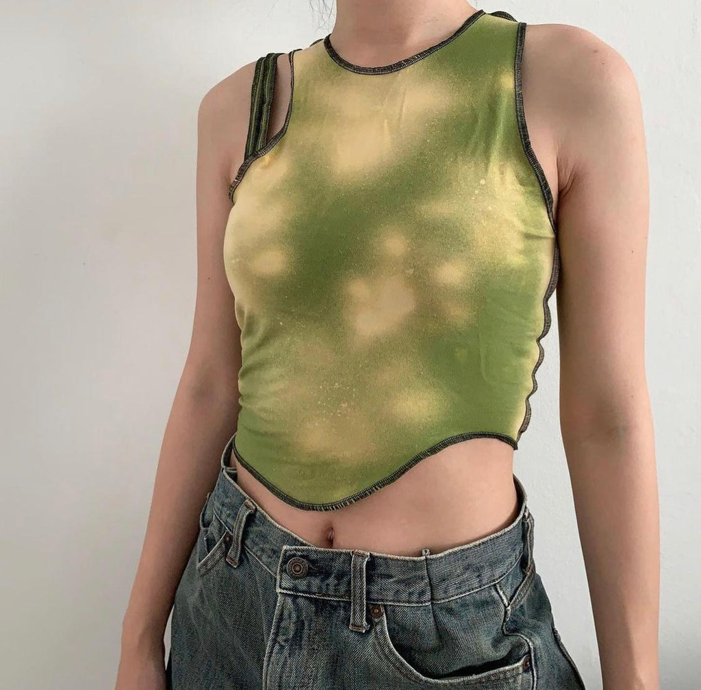 Green fabric sleeveless top  with sprayed on bleach